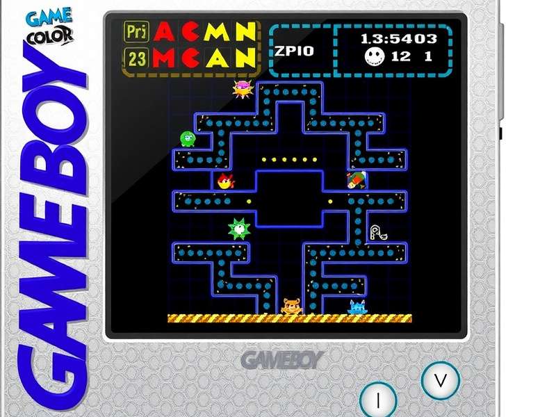 PAC-MAN gameplay on Game Boy Color screen showing yellow Pac-Man and colored ghosts