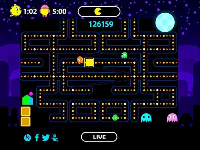 Vintage PAC-MAN arcade cabinet in a classic arcade setting