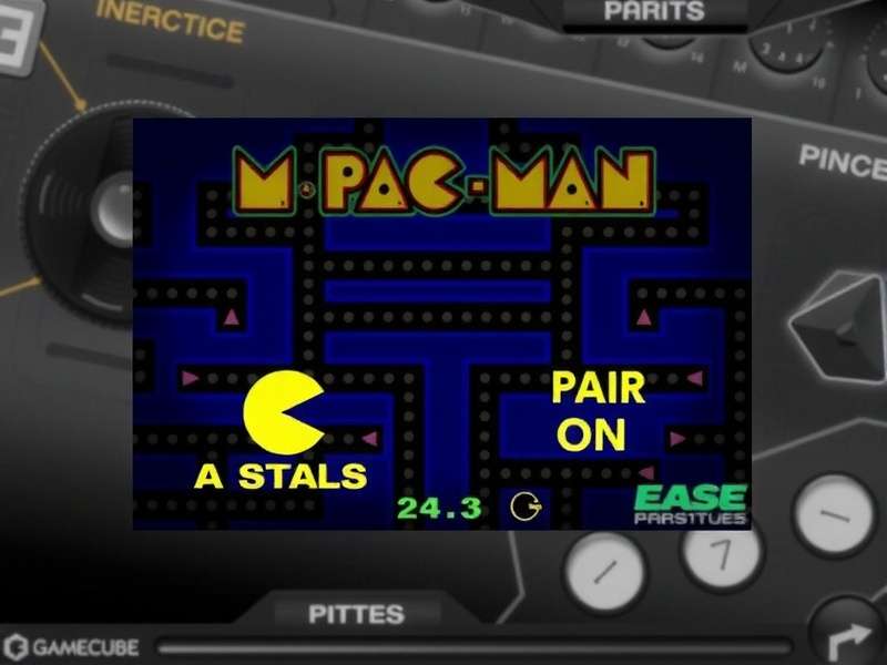 Ms Pac Man Gamecube gameplay screenshot showing the iconic maze, ghosts and Ms Pac Man herself.
